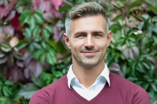 depositphotos 745925384 stock photo businessman portrait outdoor smiling mature